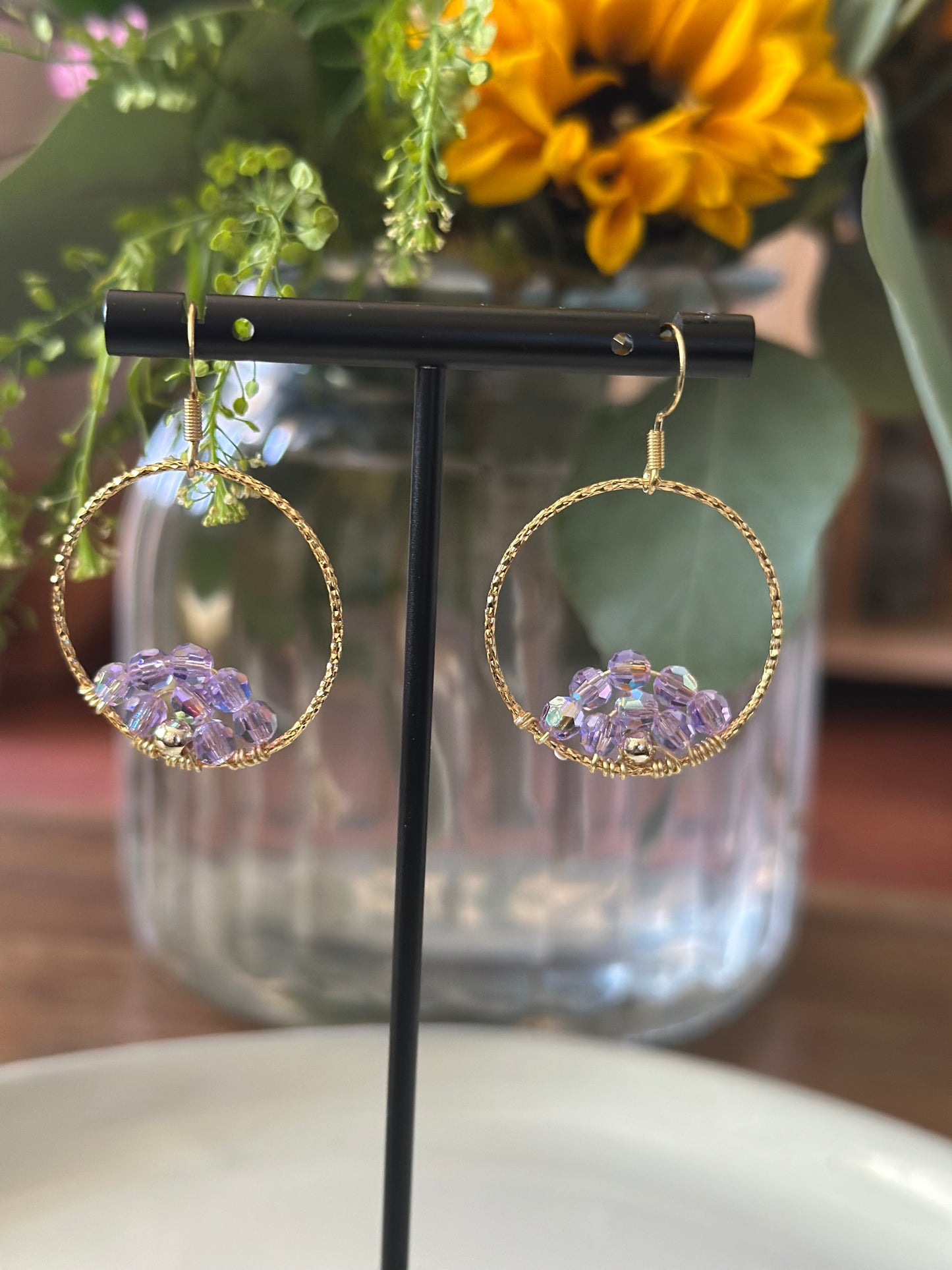Dangle and Drop Earrings in Purple and Gold.