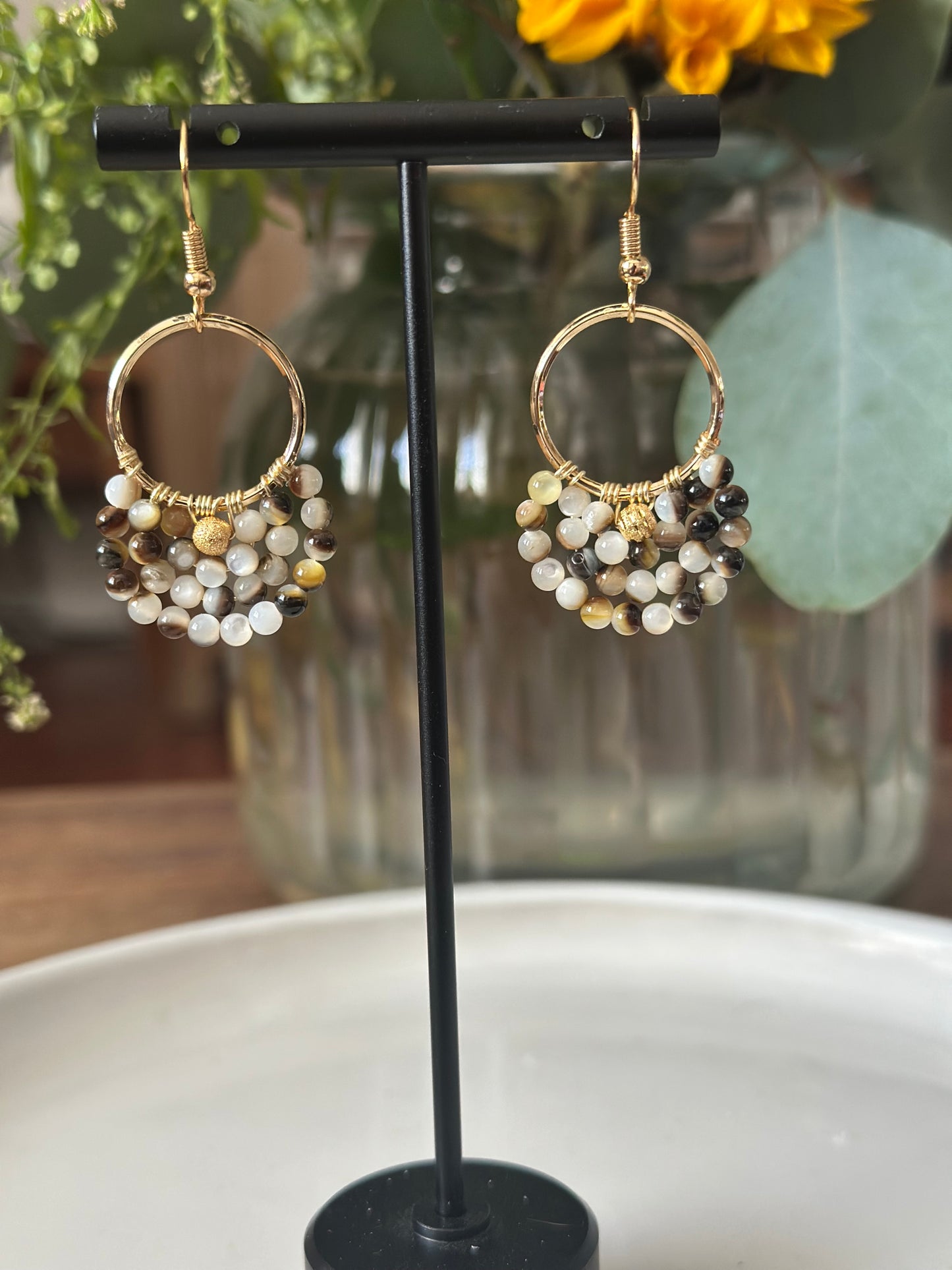 Dangle and Drop Earrings in Brown, White, and Gold. (Small).