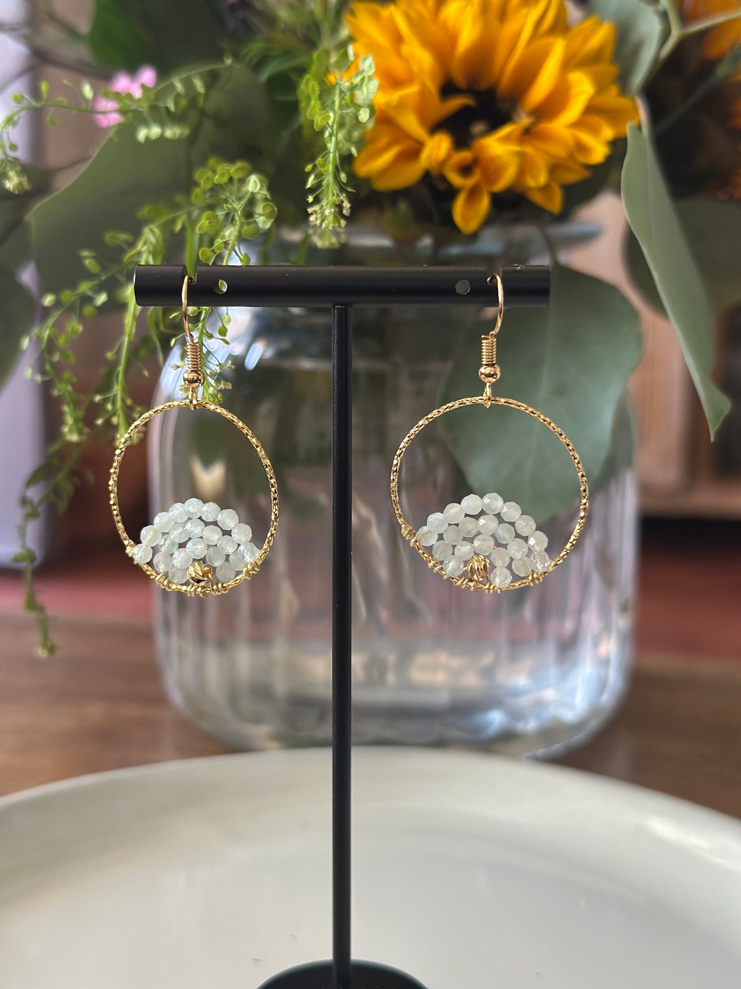 Dangle and Drop Earrings in Light Blue Aquamarine and Gold.