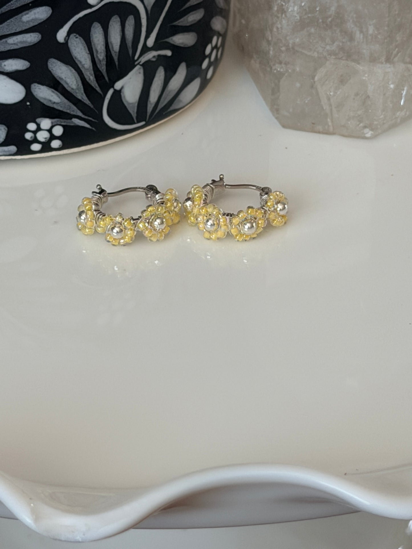 Hoop Earrings in Silver and Yellow.