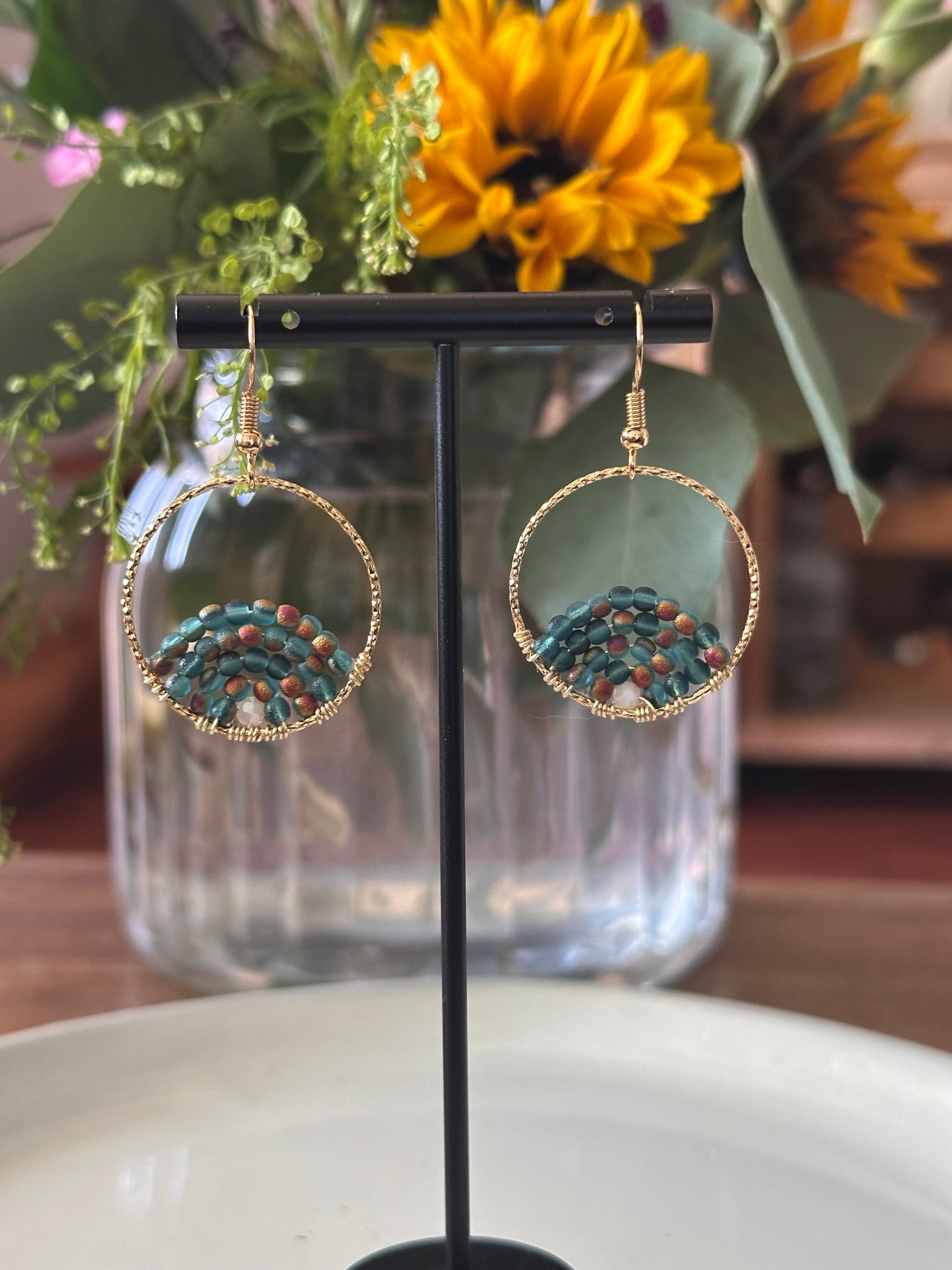 Dangle and Drop Earrings in Teal with Burned Orange marks and Gold.