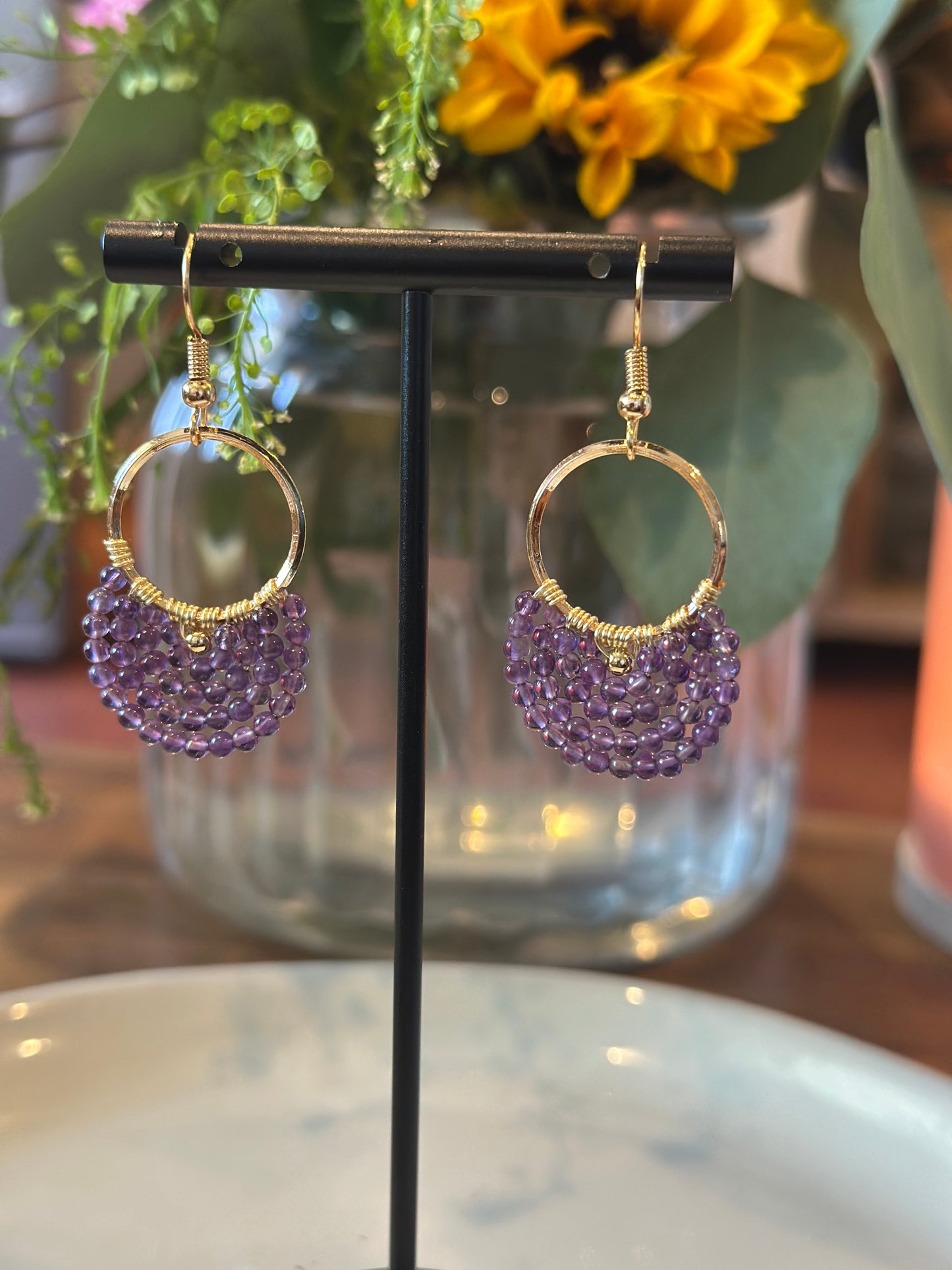 Dangle and Drop Earrings in Purple and Gold.
