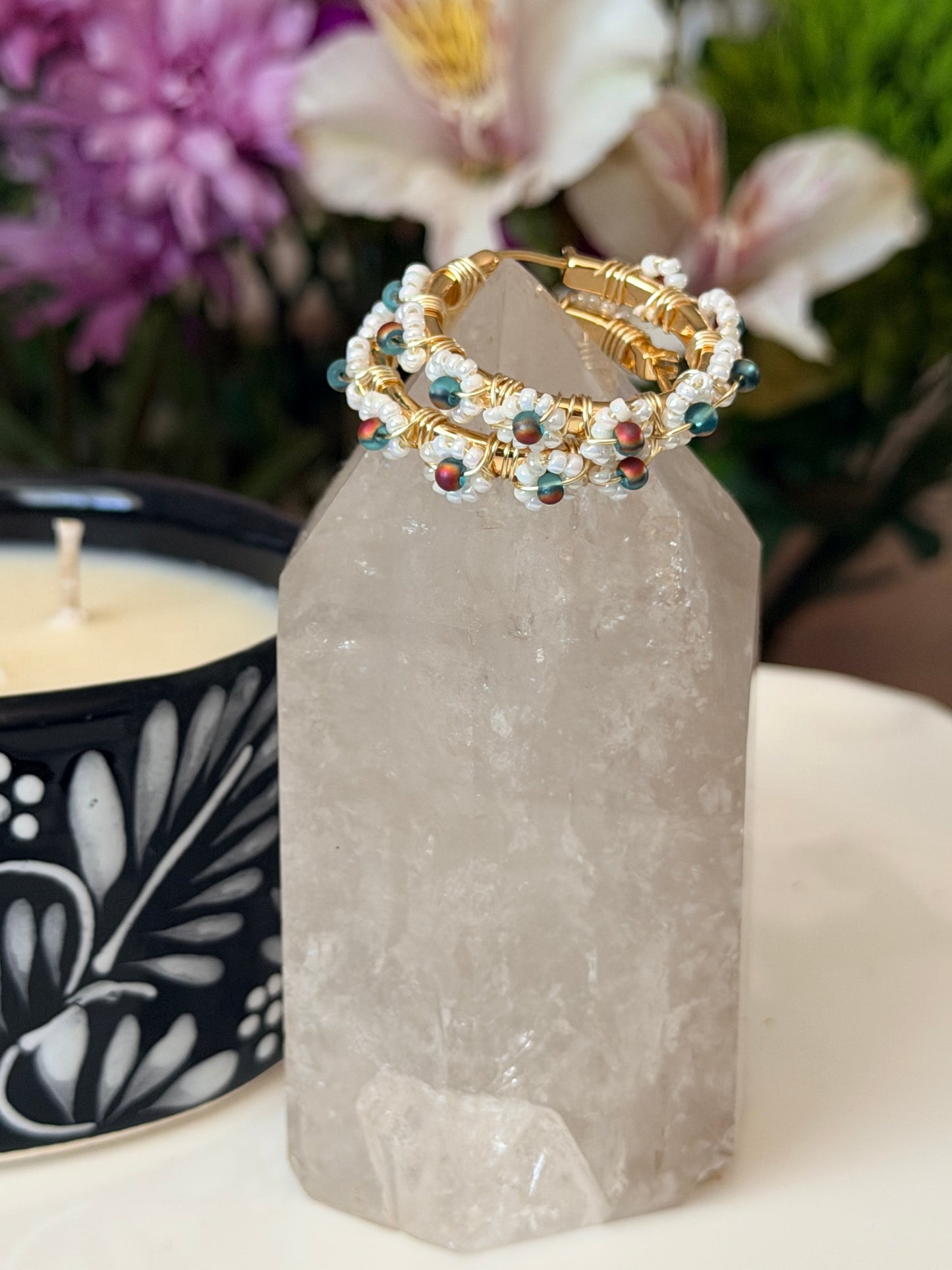 Hoop Earrings in White, Aqua Blue, and Gold.