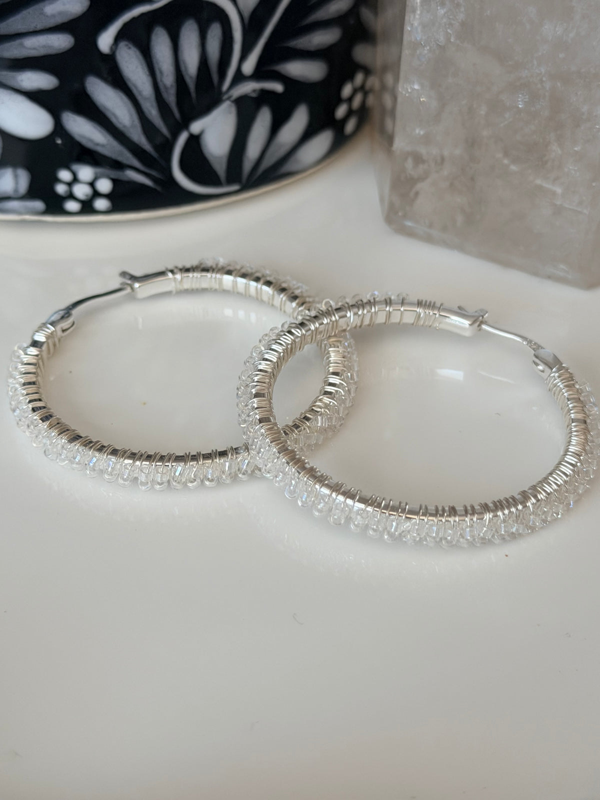 Hoop Earrings in White and Silver.