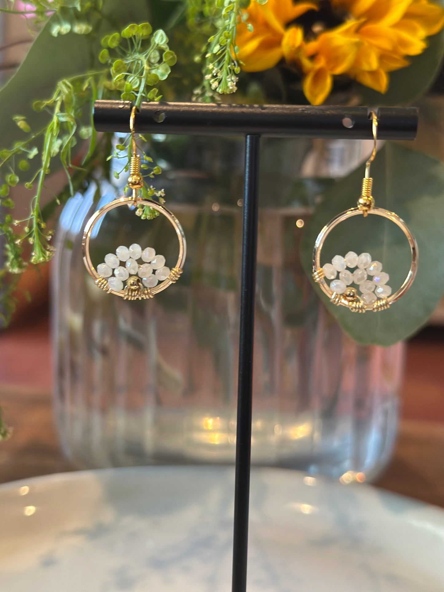 Dangle and Drop Earrings in White and Gold. (Small).