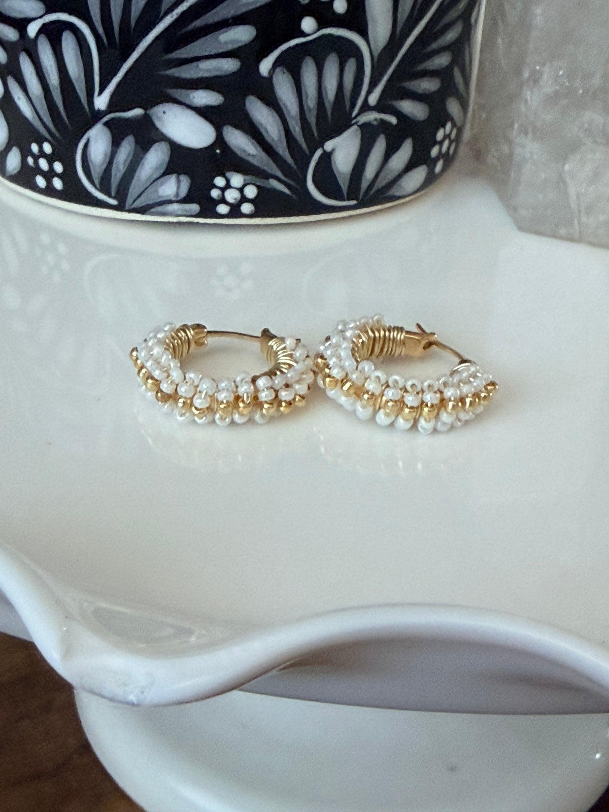 Hoop Earrings in Gold and White.