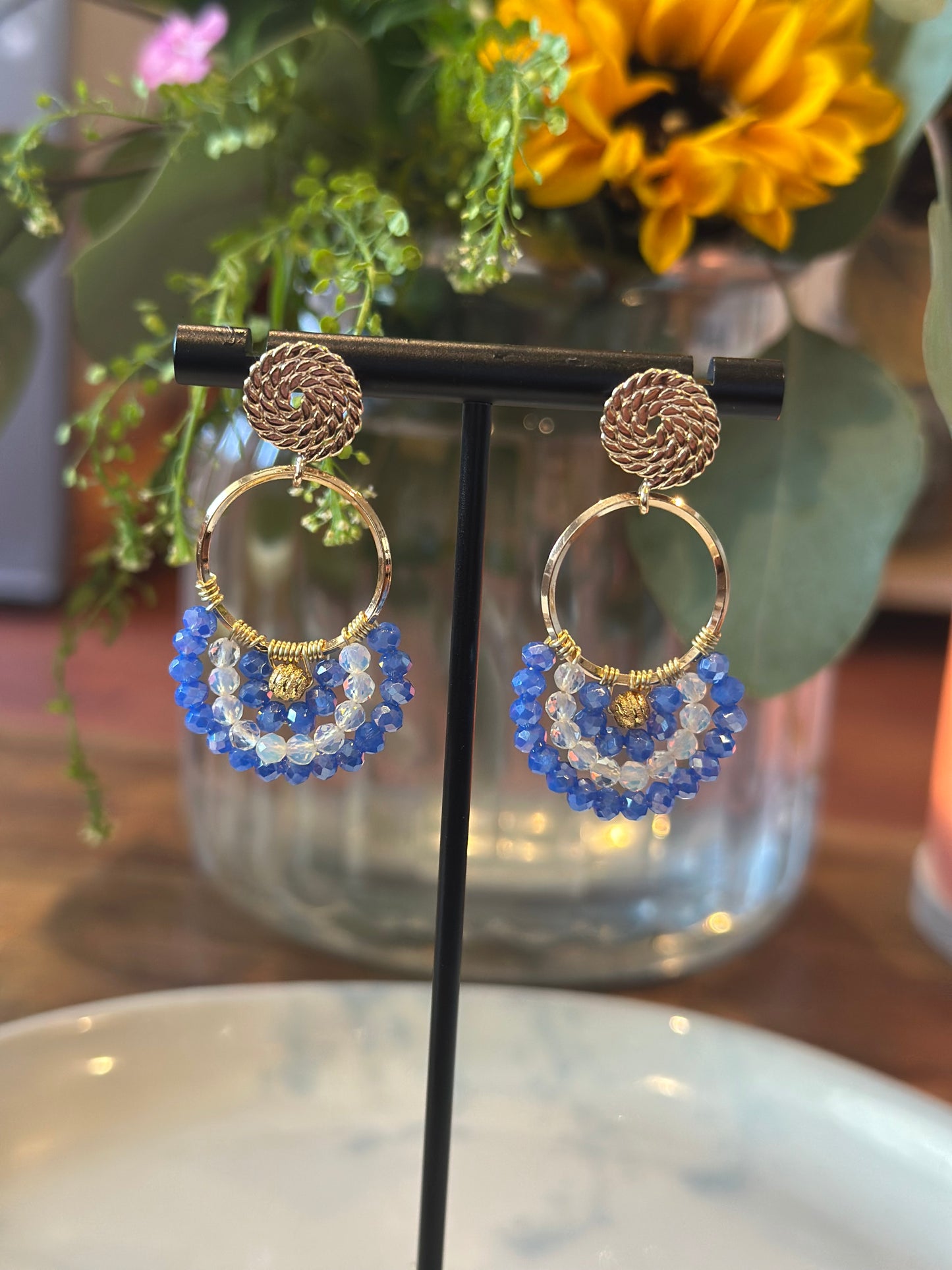 Dangle and Drop Earrings in Blue, White, and Gold.