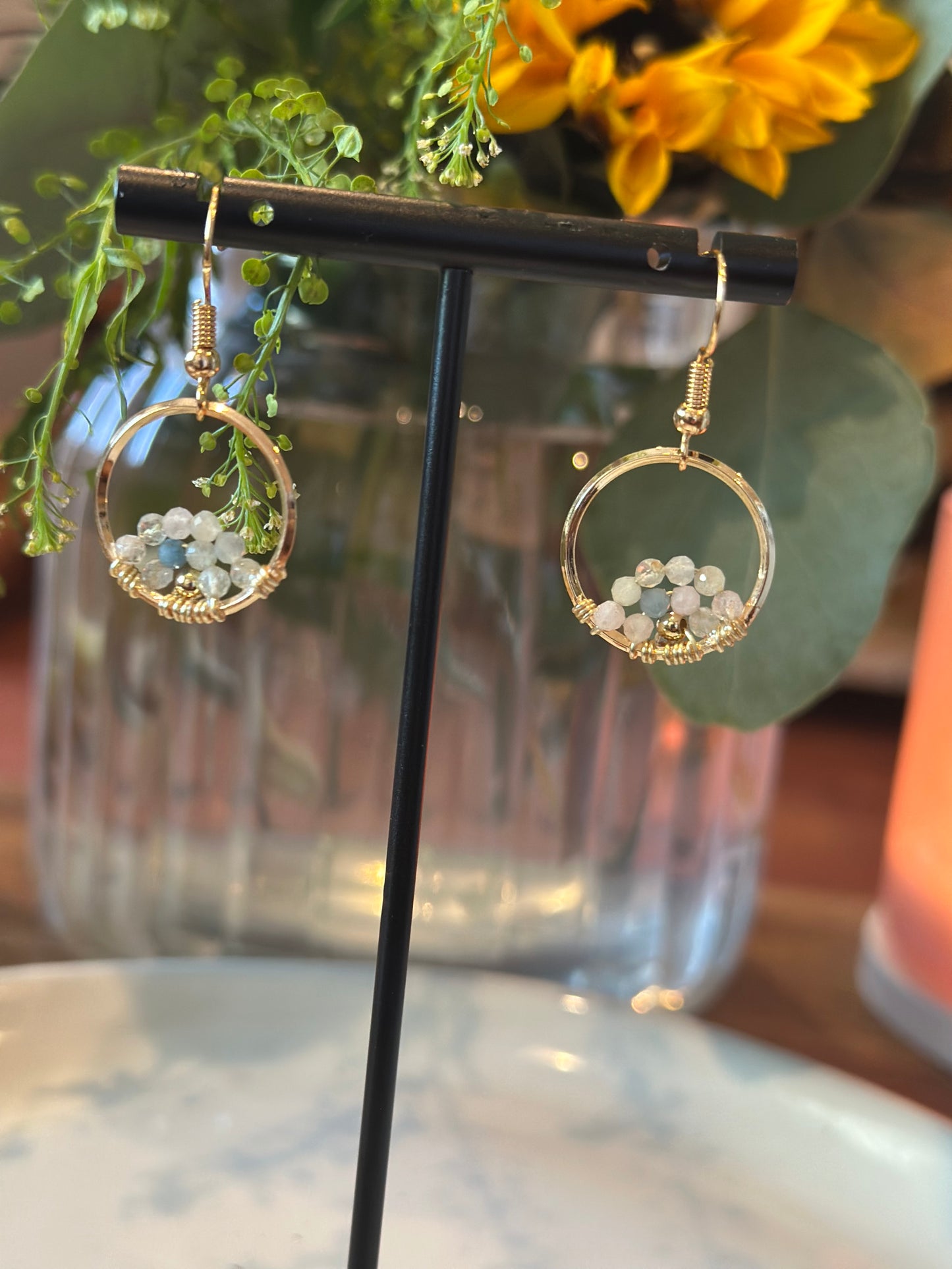 Dangle and Drop Earrings in Light Blue and Gold.