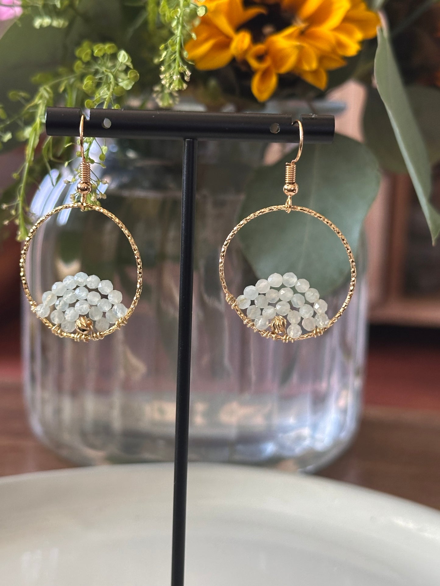 Dangle and Drop Earrings in Light Blue Aquamarine and Gold.