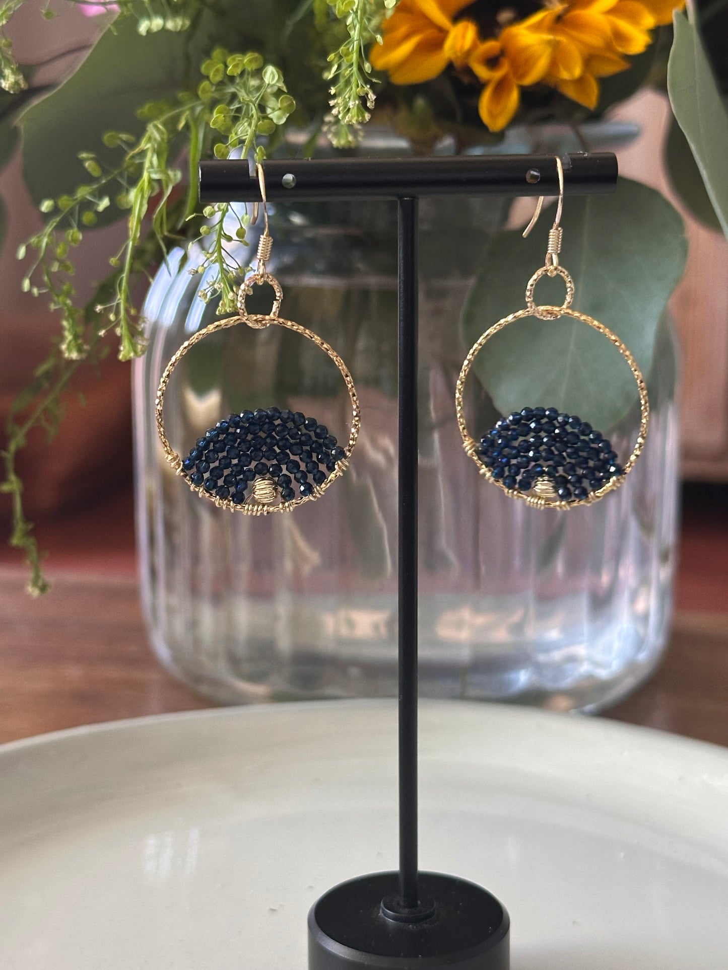 Dangle and Drop Earrings in Dark Blue and Gold.