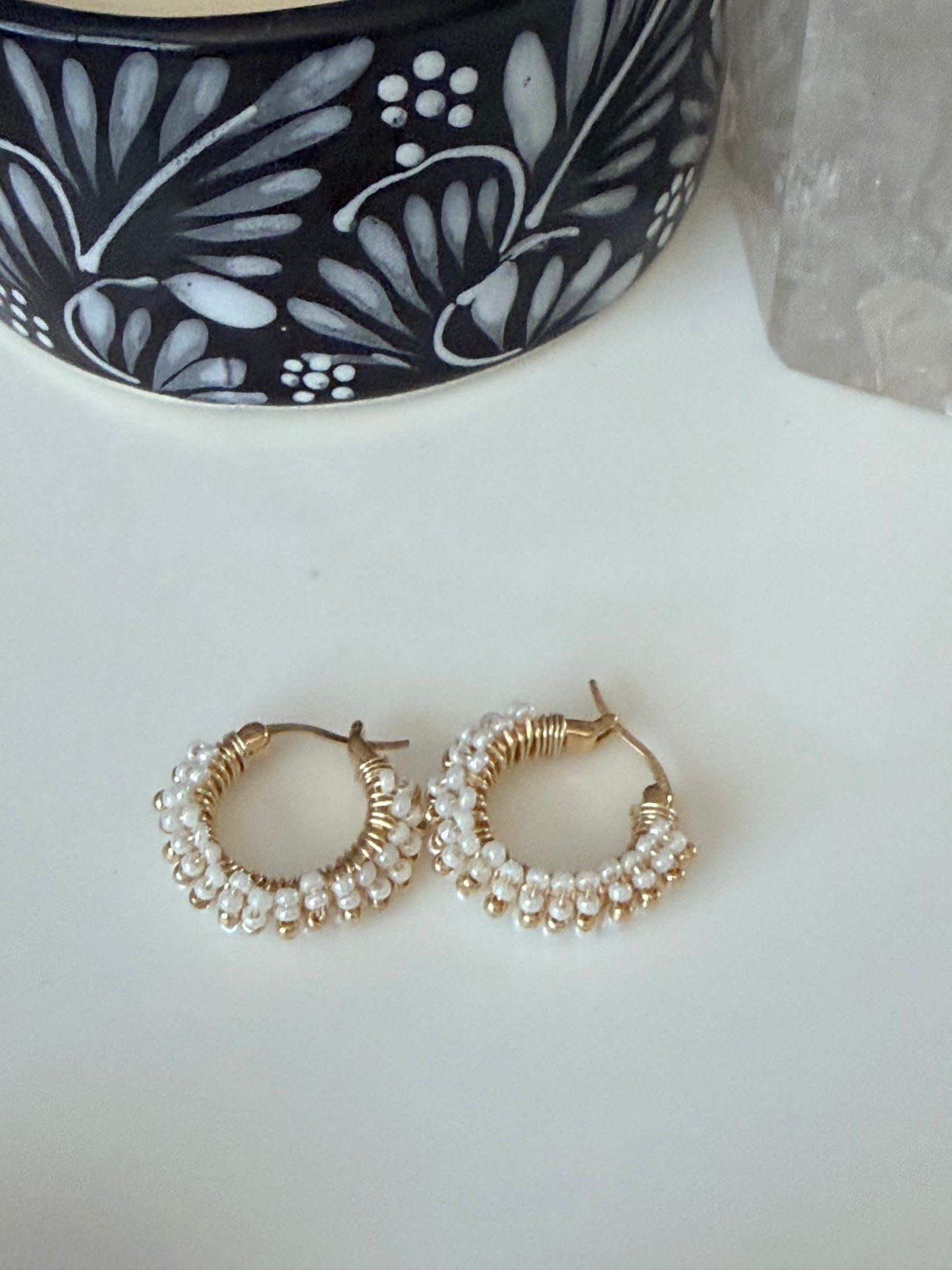 Hoop Earrings in Gold and White.