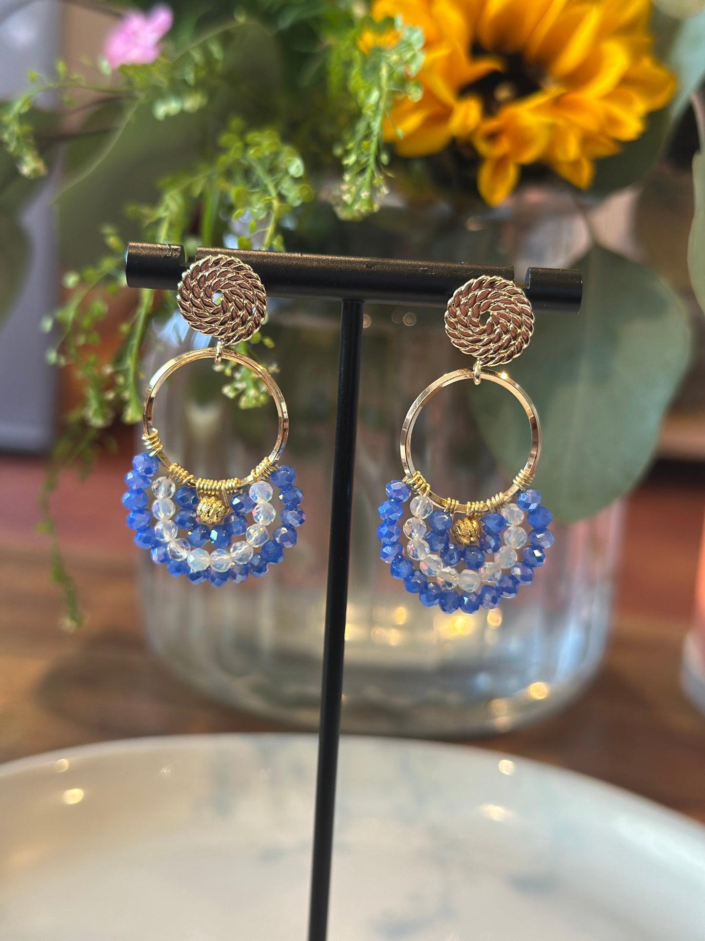 Dangle and Drop Earrings in Blue, White, and Gold.