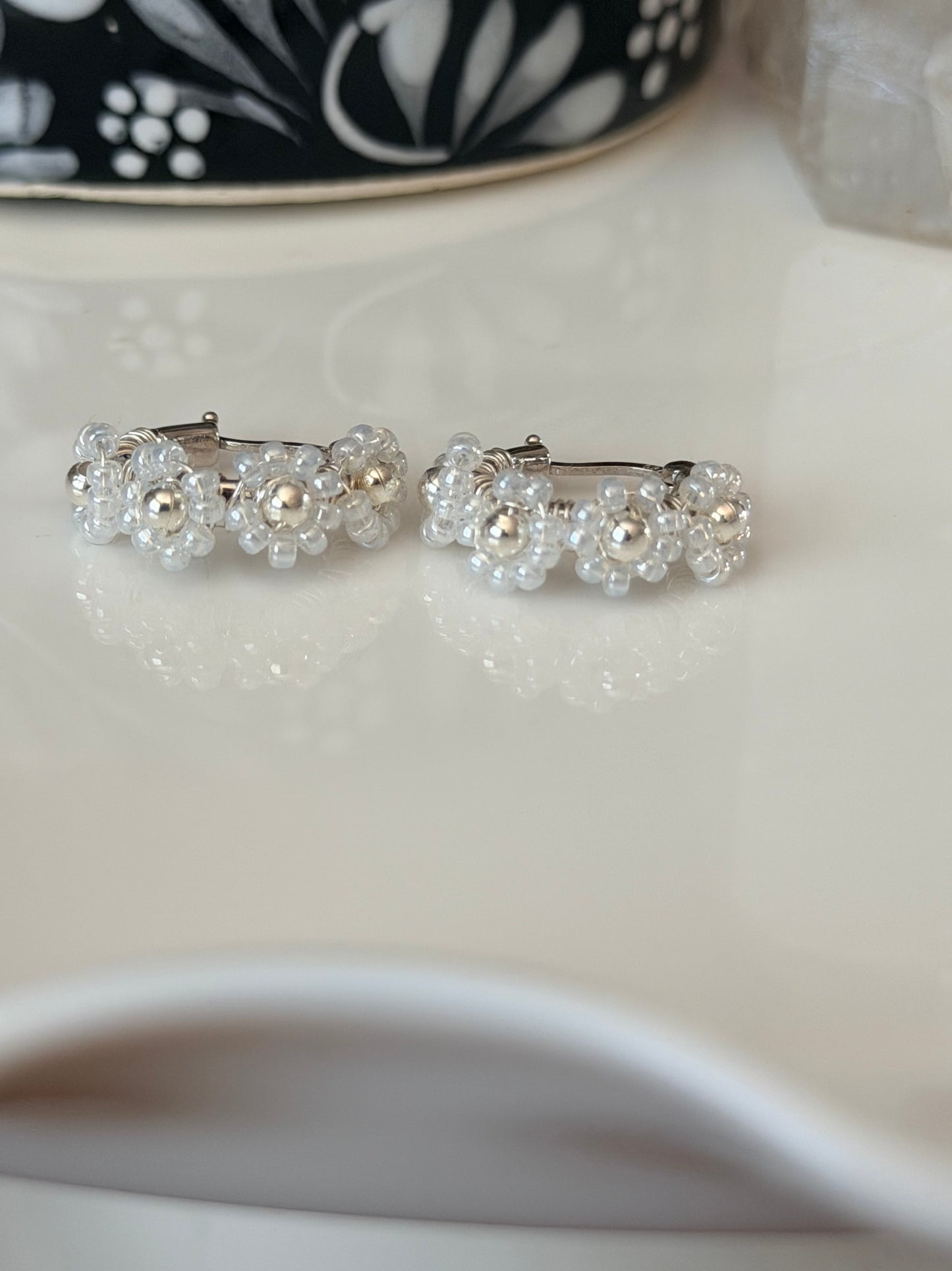 Hoop Earrings in White and Silver.