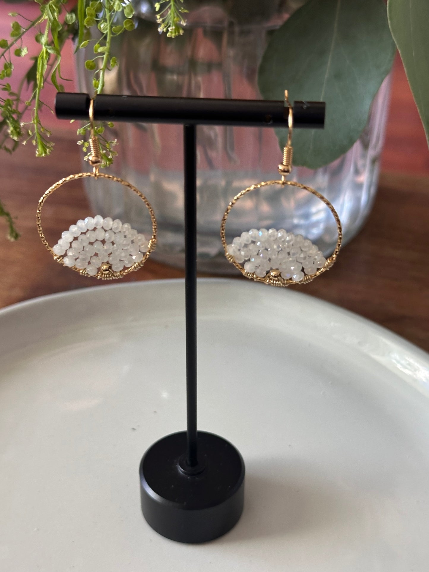 Dangle and Drop Earrings in White and Gold.