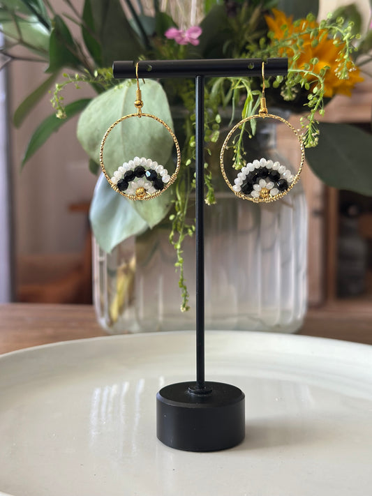Dangle and Drop Earrings in White and Black, and Gold.