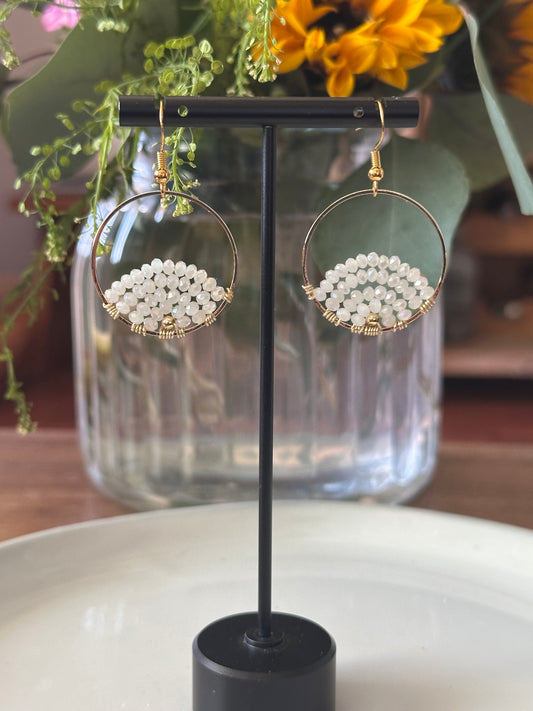Dangle and Drop Earrings in White and Gold.