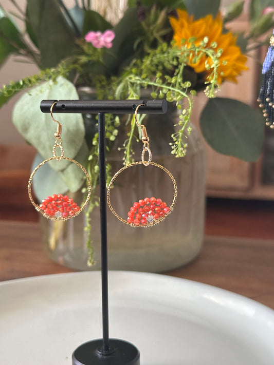 Dangle and Drop in Orange and Gold.