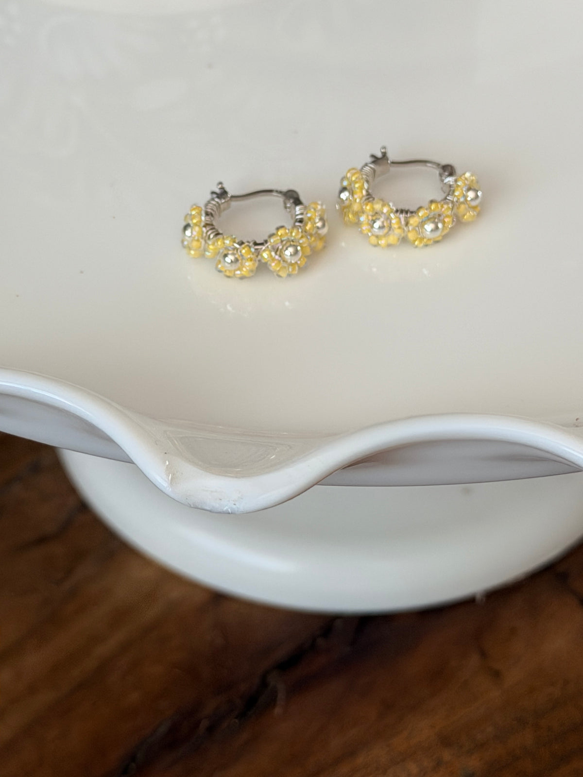 Hoop Earrings in Silver and Yellow.