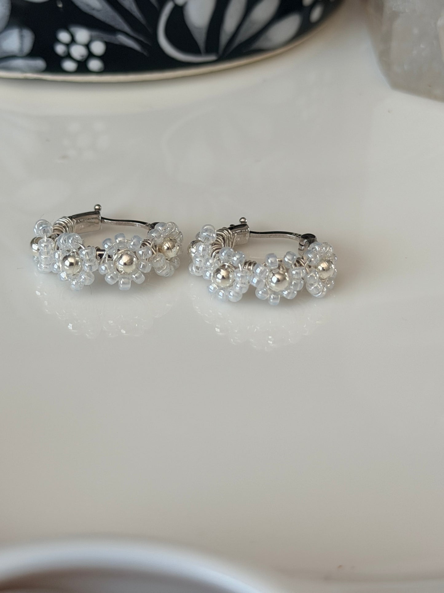 Hoop Earrings in White and Silver.