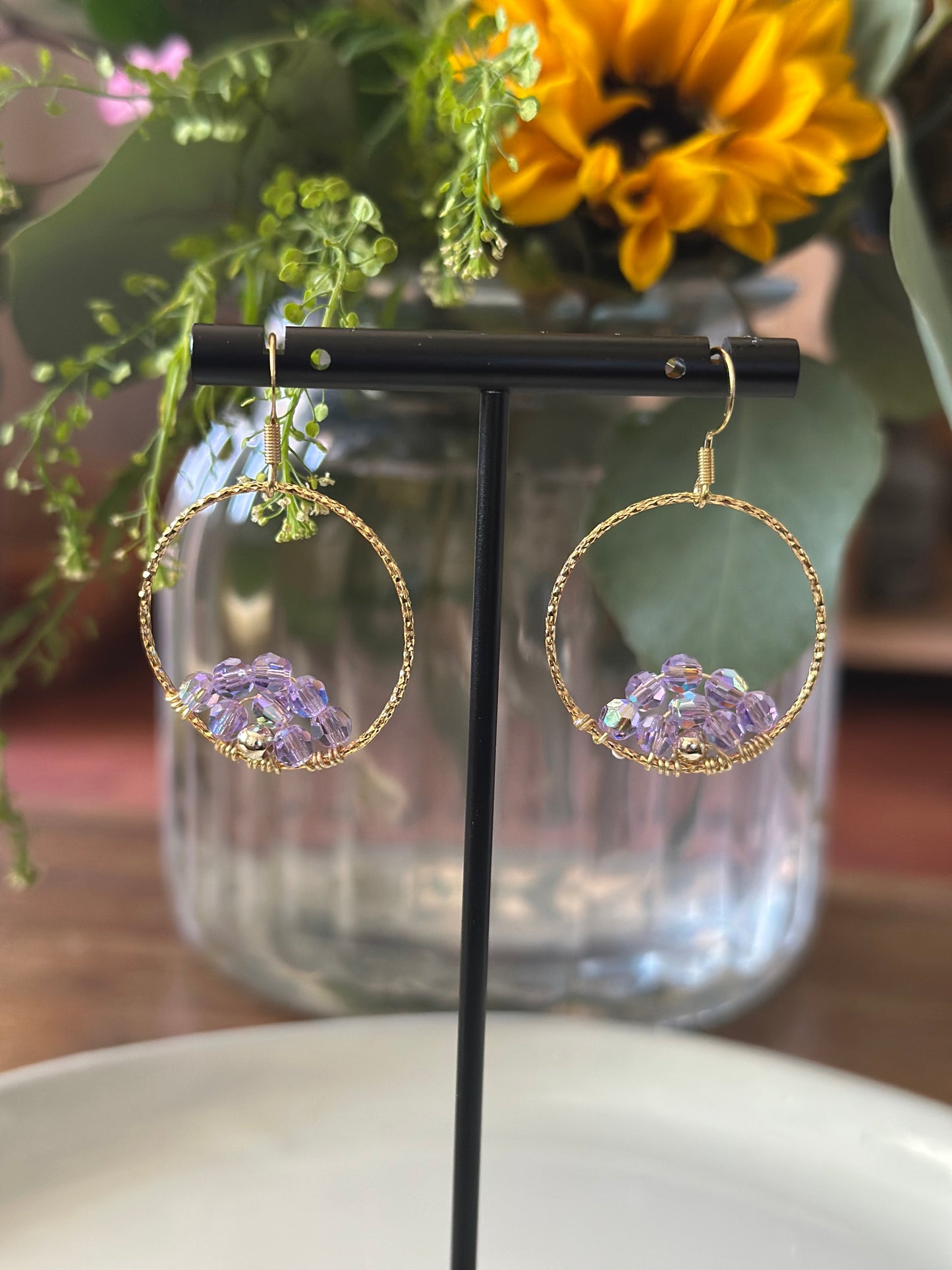 Dangle and Drop Earrings in Purple and Gold.