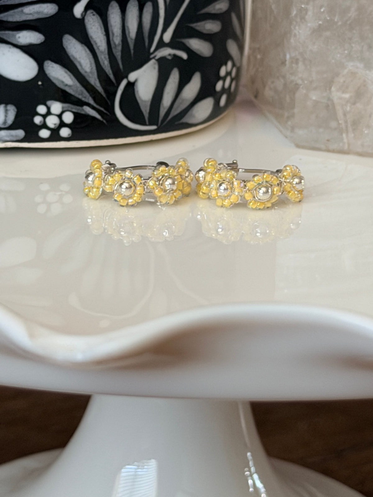 Hoop Earrings in Silver and Yellow.