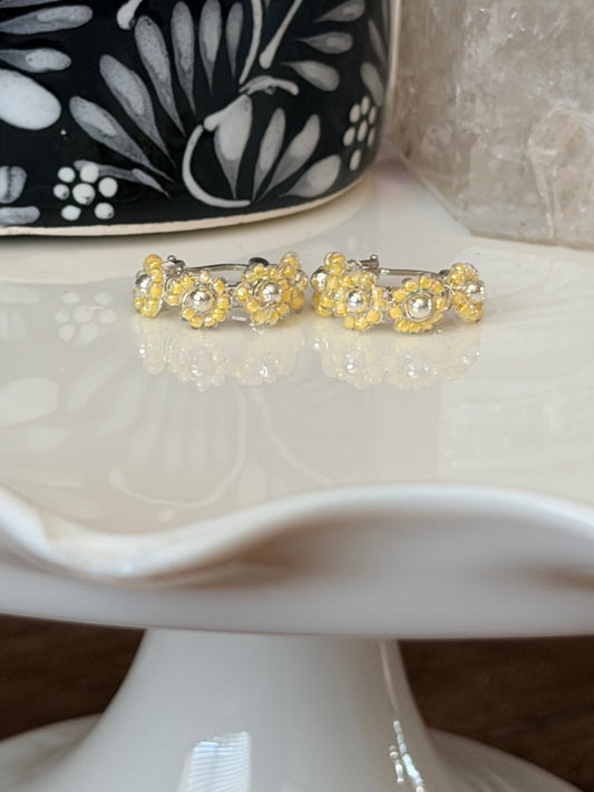 Hoop Earrings in Silver and Yellow.