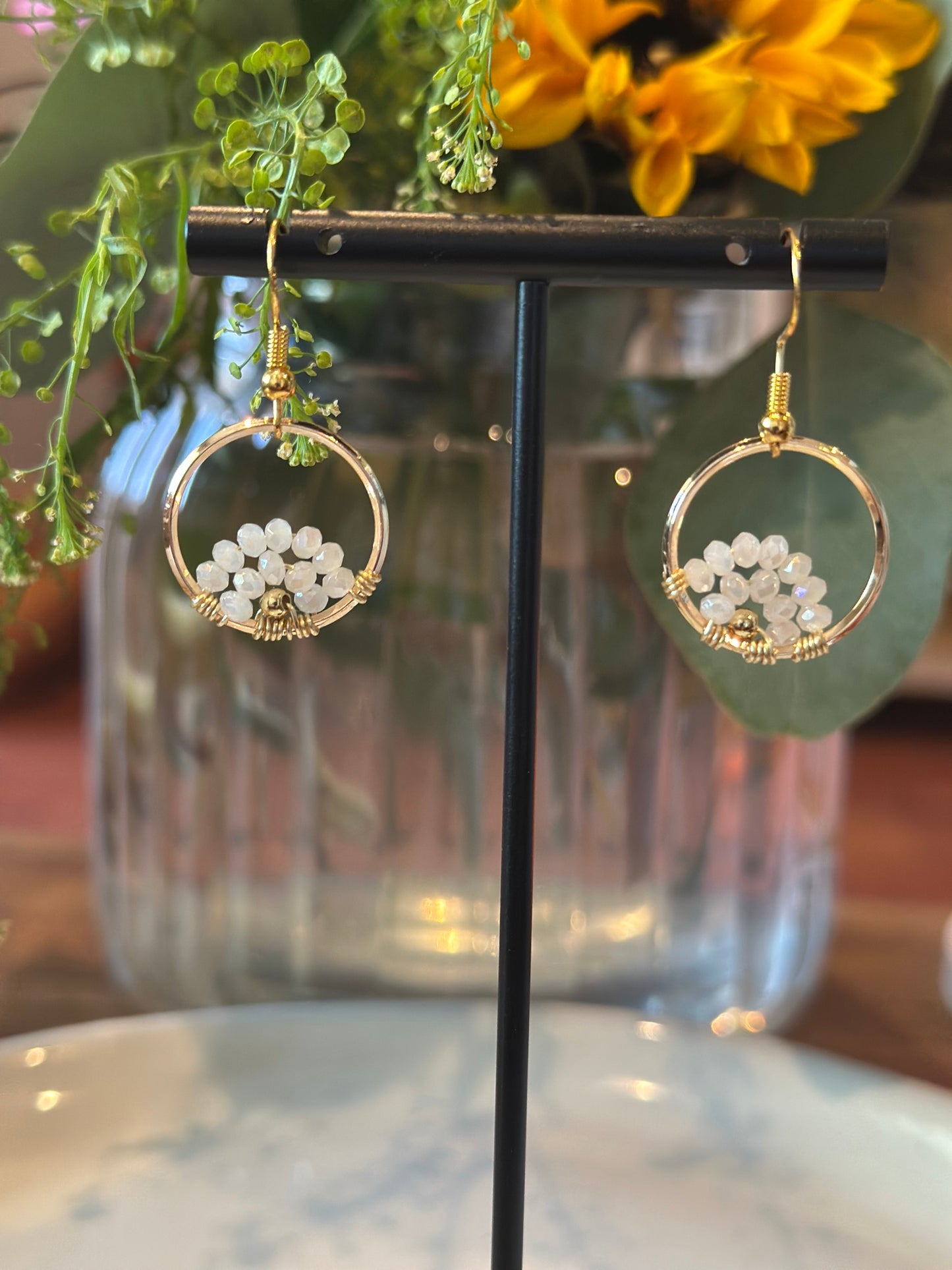 Dangle and Drop Earrings in White and Gold. (Small).