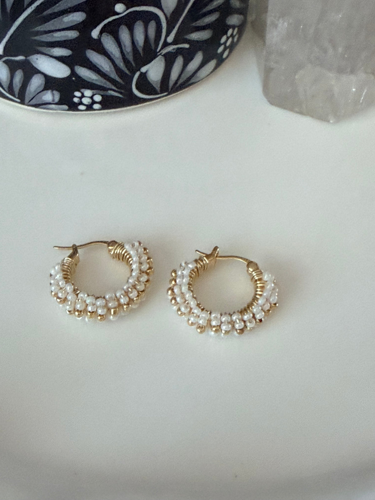 Hoop Earrings in Gold and White.