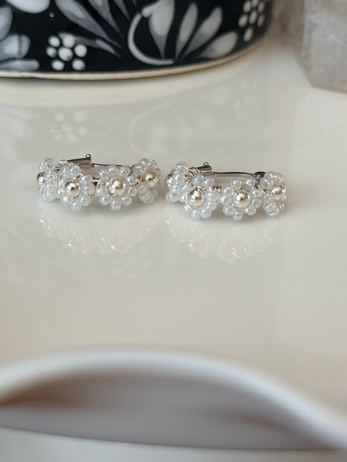 Hoop Earrings in White and Silver.