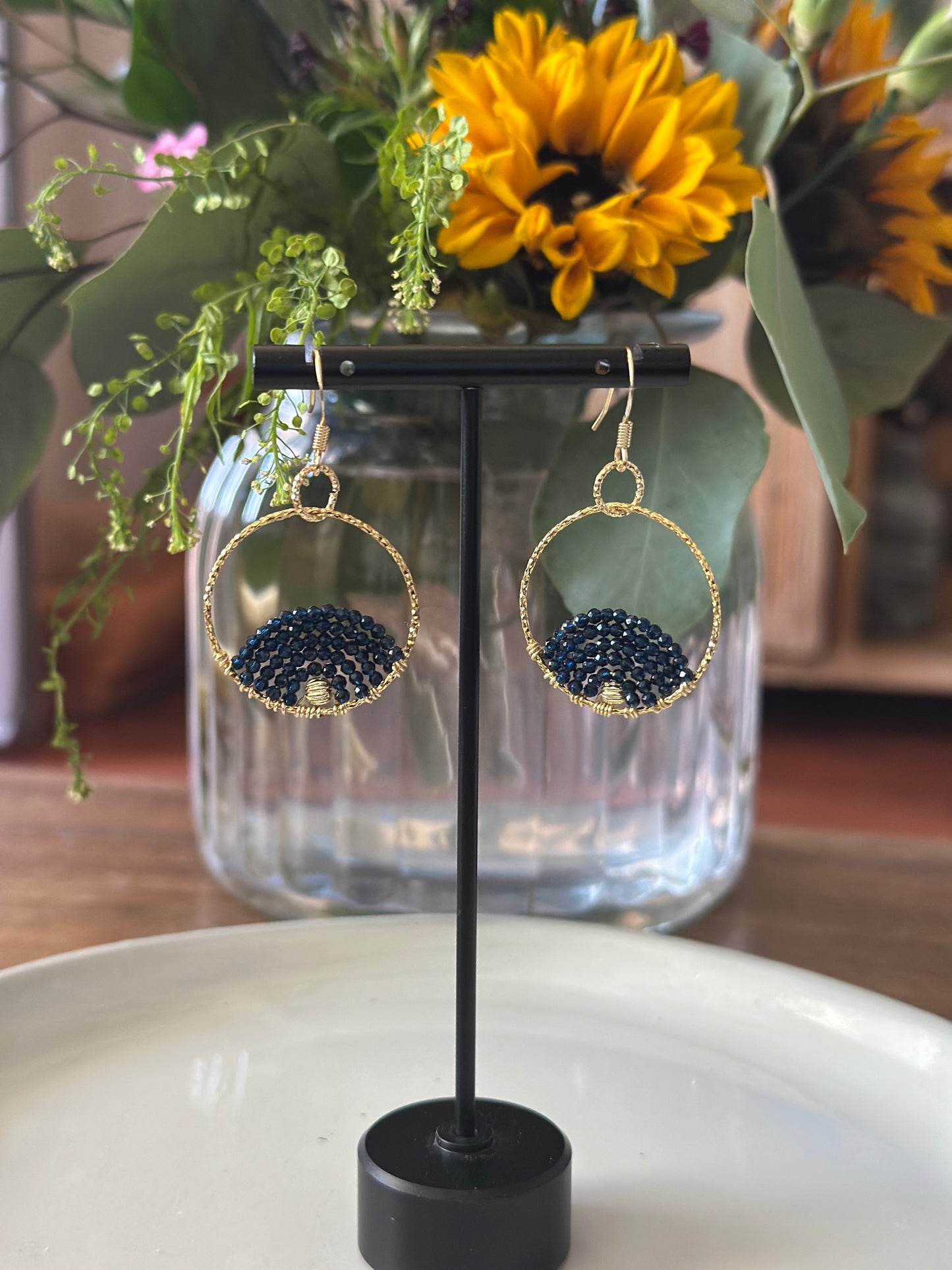 Dangle and Drop Earrings in Dark Blue and Gold.