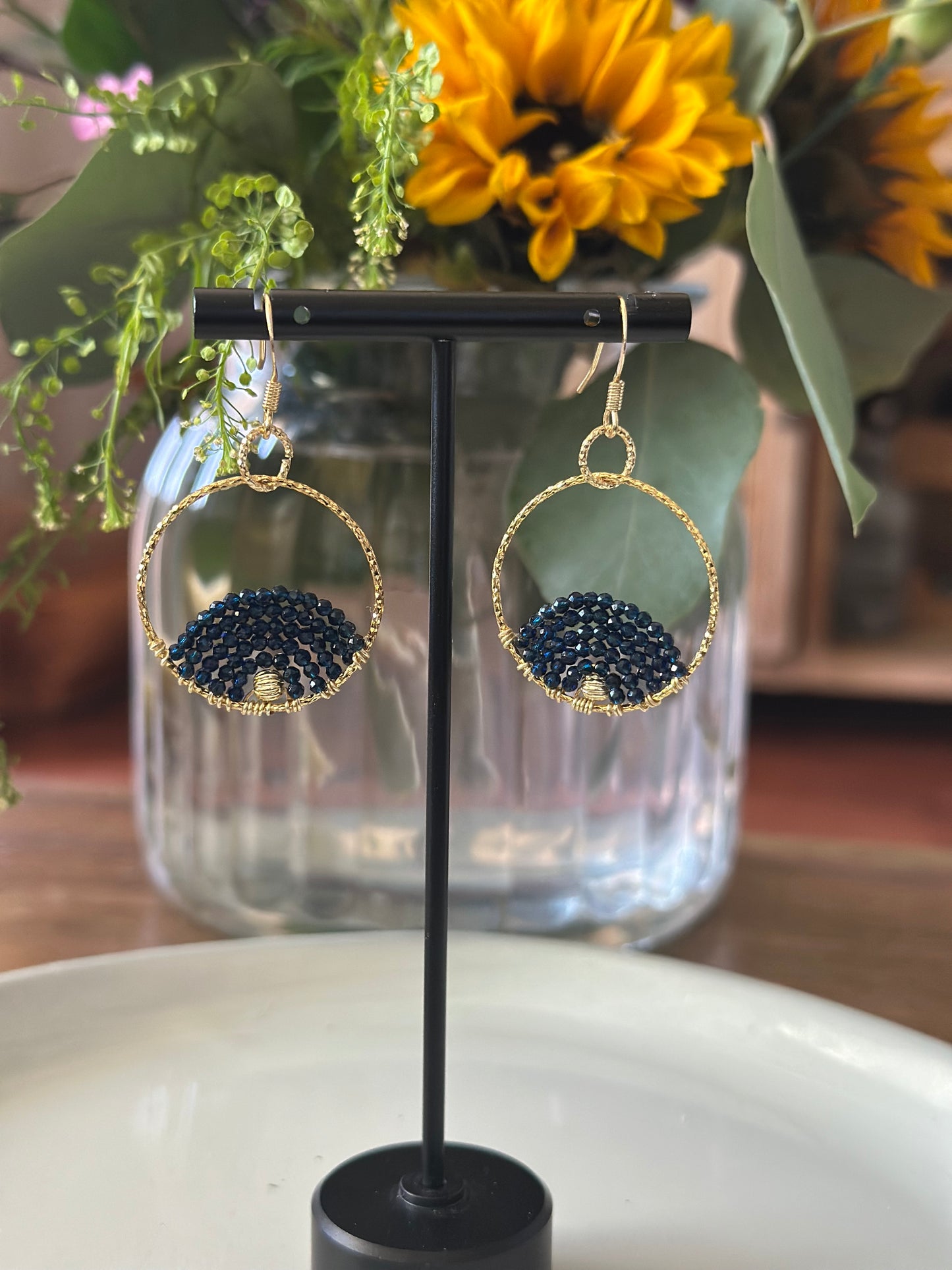 Dangle and Drop Earrings in Dark Blue and Gold.