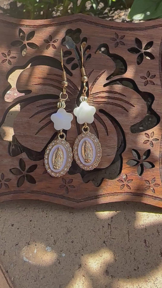 Dangle and Drop Earrings in White and Gold.